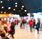 Blurred crowd of people in modern interior during event
