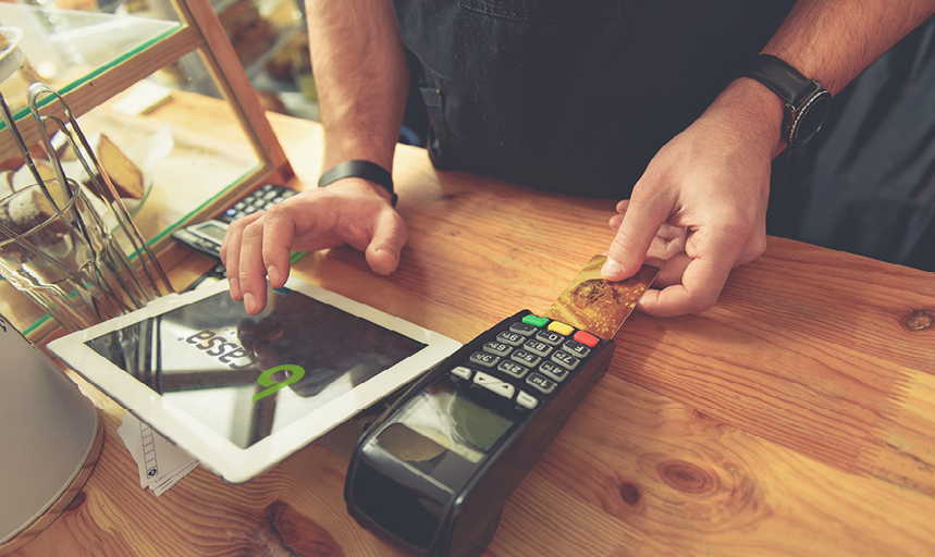 Man rendering account with access point in coffee shop