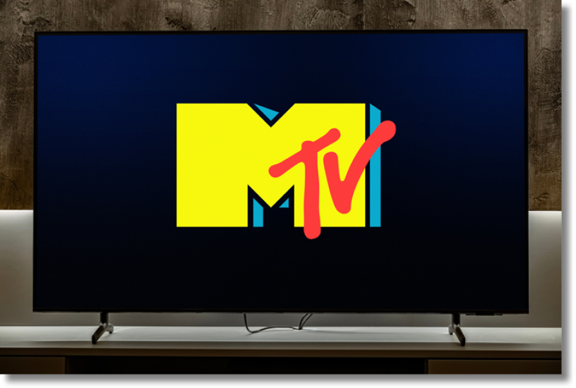 POZNAN, POL - DEC 19, 2023: Flat-screen TV set displaying logo of MTV, an American pay television channel, based in New York City