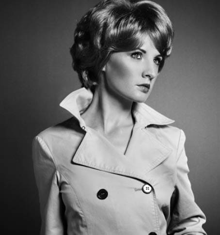 Portrait of beautiful sensual woman with elegant hairstyle. Retro hairdo