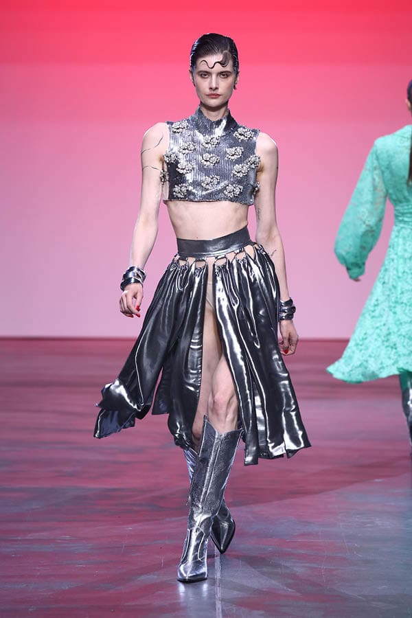 BERLIN, GERMANY - JULY 03: A model walks the runway at the COLLECTIVEFOUR Marcel Ostertag show during Berlin Fashion Week SS25 at Uber Eats Music Hall on July 03, 2024 in Berlin, Germany. (Photo by Sebastian Reuter/Getty Images for COLLECTIVEFOUR Marcel Ostertag)