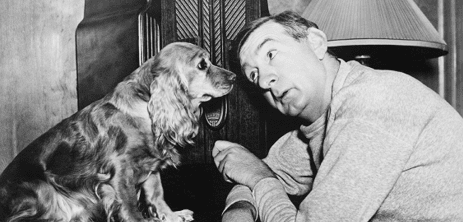 Man and dog listening to the radio