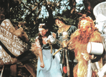 Viersen, Germany - May 9. 2024: Photo of the Wizard of Oz film scene detail in haunted forest with Juda Garland from 1939 in old magazine (focus on center)