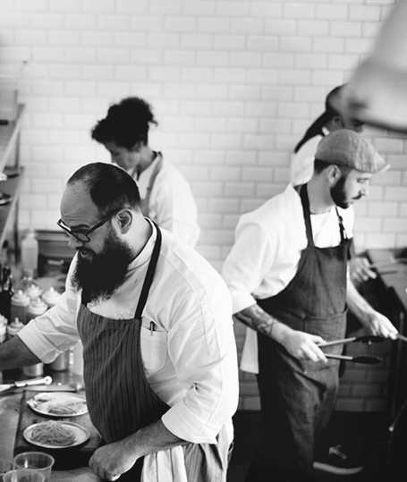 Group of chefs working in the kitchen