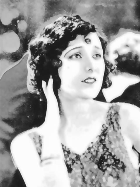 Viersen, Germany - June 9. 2024: Photo of Gold Rush film scene with with Charlie Chaplin and Georgia Hale from 1925 in old magazine (focus on center)