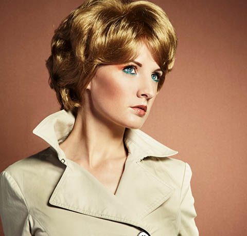 Portrait of beautiful sensual woman with elegant hairstyle. Retro hairdo